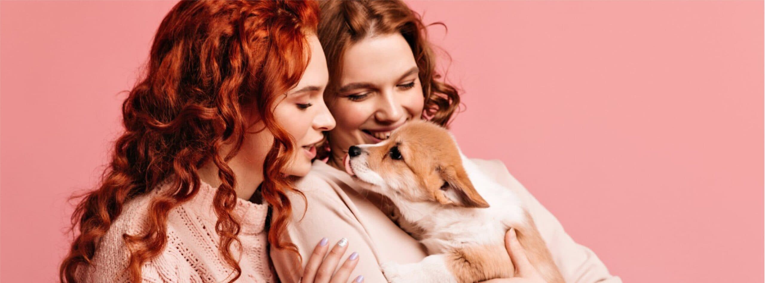 Two women with a dog